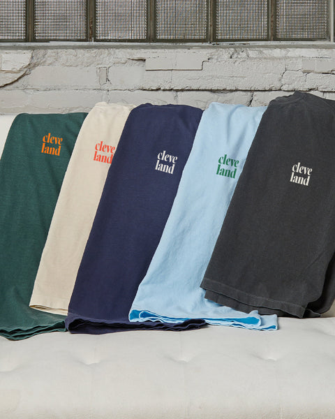 Full display of Cleveland t-shirts in multiple colors