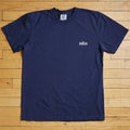Navy blue t-shirt with 'tulsa' logo on a wooden floor